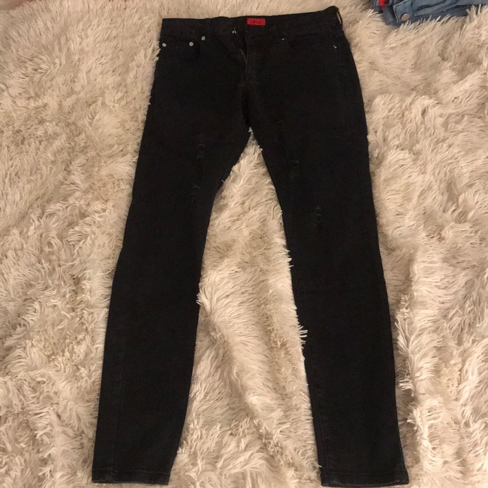 Killion Distressed Tapered Denim Jeans